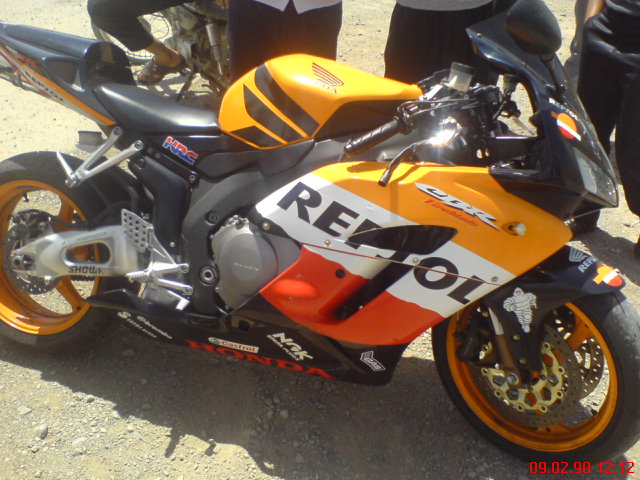 http://s1.picofile.com/file/7309490000/Repsol.jpg