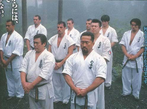 http://s1.picofile.com/file/7640447525/Andy_Hug_on_K_1_Dream_Camp_with_karate_fighters.jpg